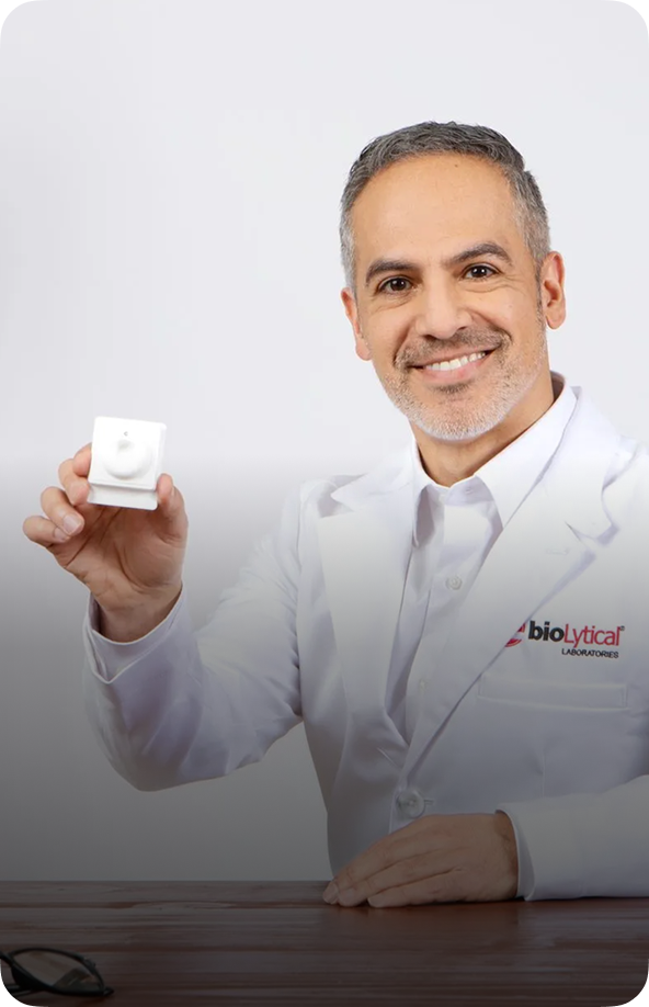 bioLytical Laboratories doctor holding INSTI HIV rapid test device